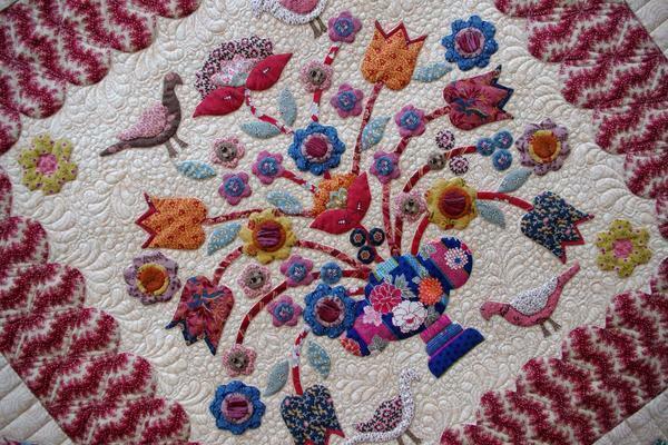 Applique in patchwork style is a good way to decorate clothes or interior items