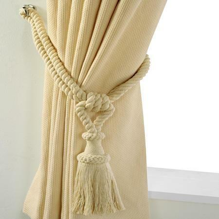 Curtains can be tied with a standard curtain tape, which usually comes in the kit, you can also use a string with brushes