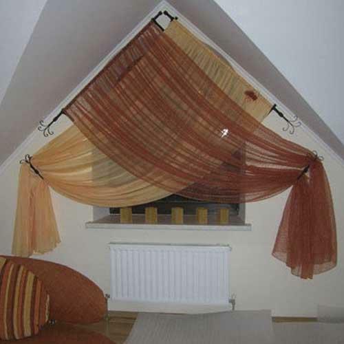 Curtains on the triangular window must be sewn individually, focusing on photos in magazines or catalogs