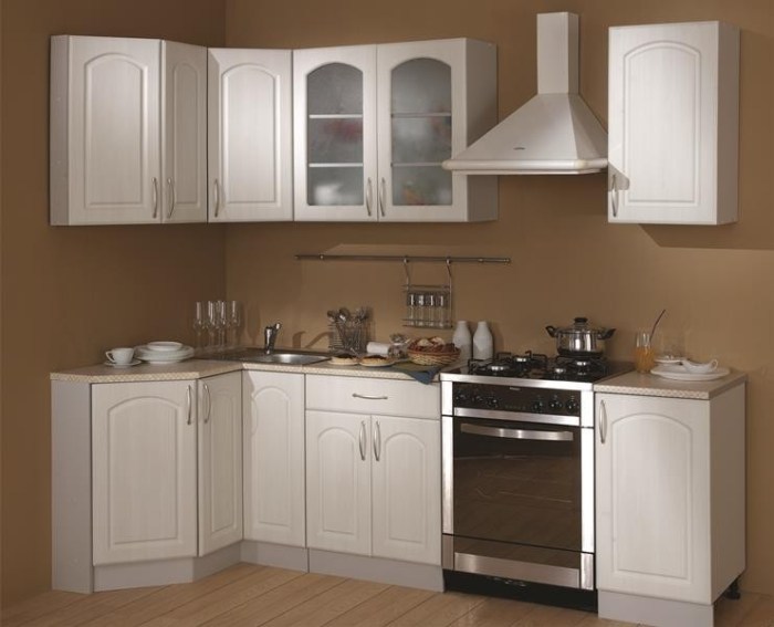 Inexpensive corner kitchen of classical style