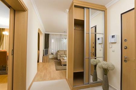 A narrow cabinet is excellent for small hallways, because it takes up little space and fully fulfills its functions