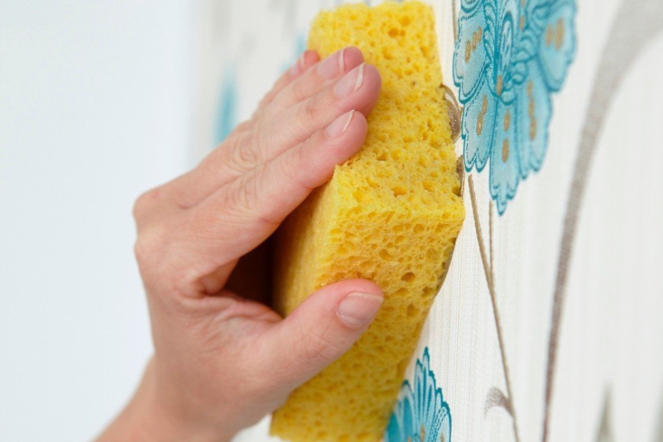 Removing excess glue with a sponge