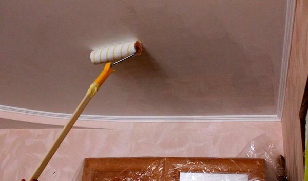 Before applying the glass wool, the whole surface of the ceiling is treated with a special primer