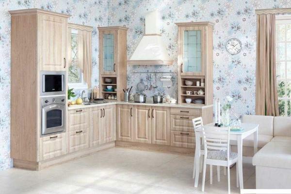 A beautiful decoration of the walls - wallpaper in the style of vintage. A bright, slightly primitive coating will make the kitchen homely and warm