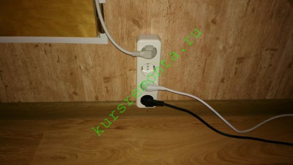 On photo - one of the outlets in the attic of my house. Wiring in the skirting board with cable channel and sockets are installed directly above it.