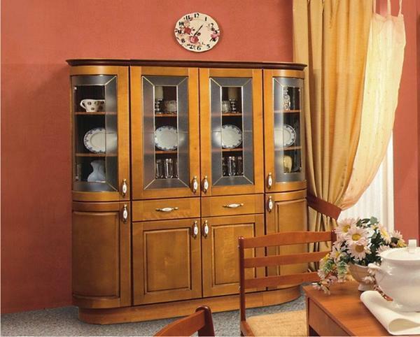 The presence of a beautiful cupboard makes the interior of the living room more refined