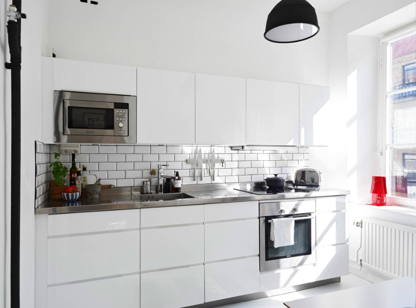 Mūsdienu skandināvu stila interjers dizains ir vizuāli paplašina telpu neliela virtuve