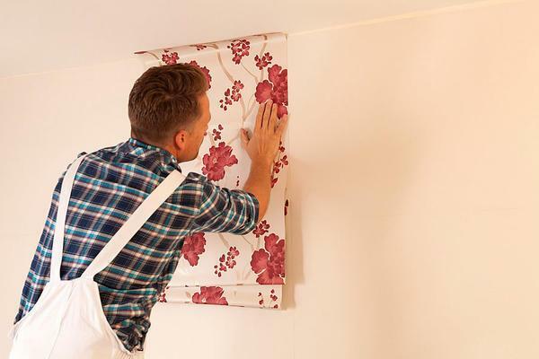 Before you glue the wallpaper, you should prepare the wall and treat it with a special tool