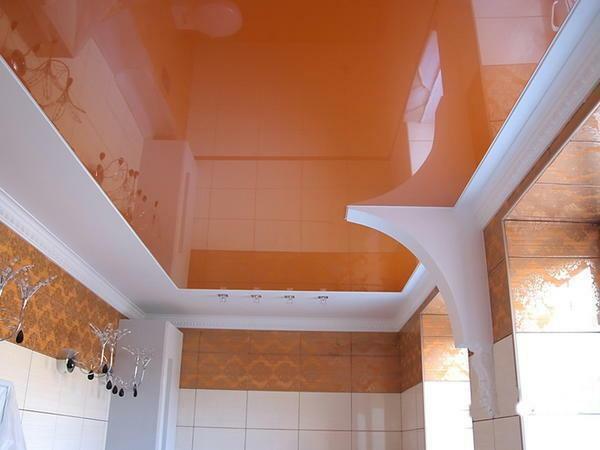 Glossy ceiling is ideal for a bathroom