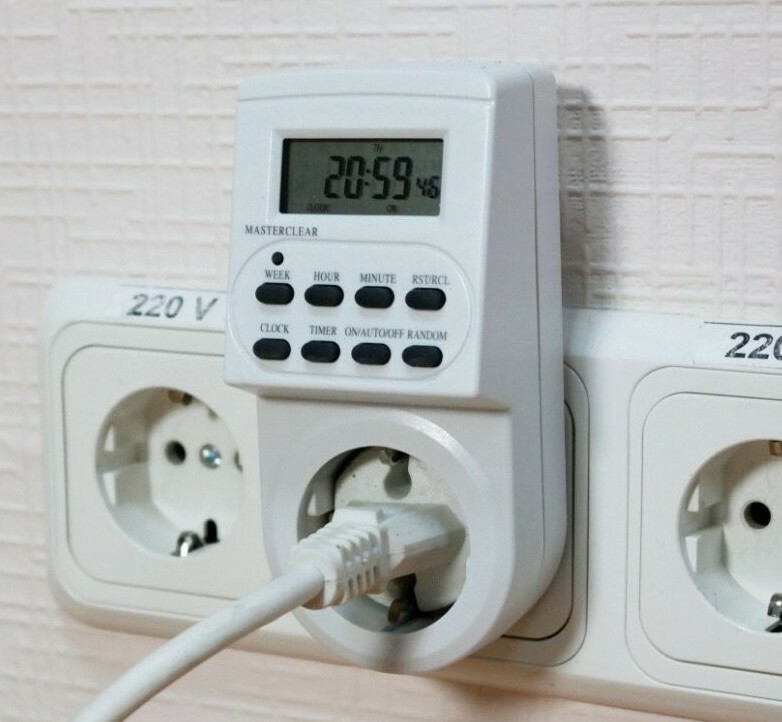 Photo is connected to the power supply socket-timer