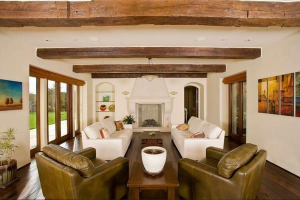 Design of the ceiling with beams: photo of the interior, with their own hands in the country, light false posts, imitation polyurethane, all about the ceiling, the design of the living room