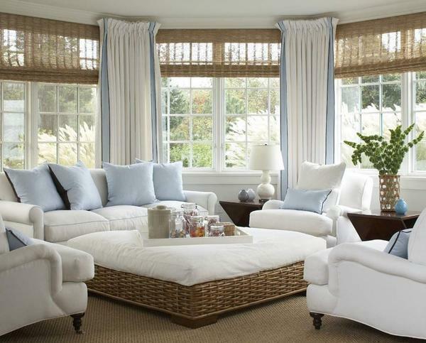 On the bay window from three windows it is better to choose light and practical curtains of light shades