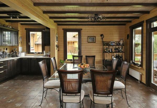 When plating a wooden ceiling, it is not necessary to hide beams and beams, because they can be simply enough to decorate