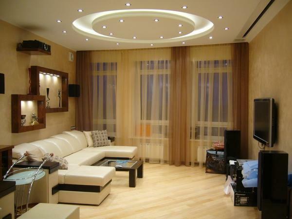By decorating the living room with spotlights, you will receive an additional light source and emphasize the individuality of your own design