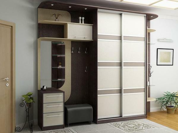 The wardrobe for the hallway should be chosen so that it harmoniously complements the interior of the room