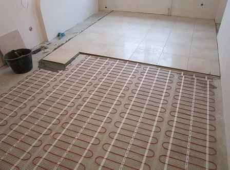Before laying a warm floor under the tile, you should carefully study the theoretical part of the process