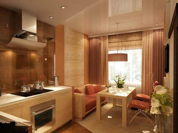 The style of a small kitchen-living room can be designed for installation of built-in home appliances
