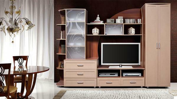 For a small living room you can use a wall without a cabinet, so you can save space